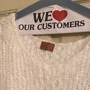 Cute white fuzzy sweater … large and way too hot for NO